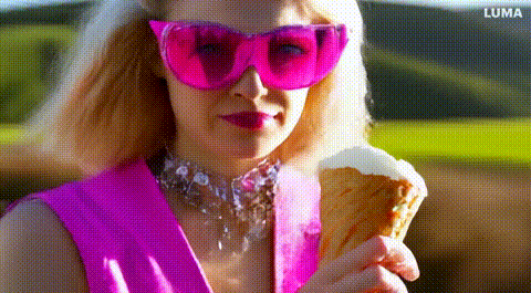 A young woman holding an ice cream